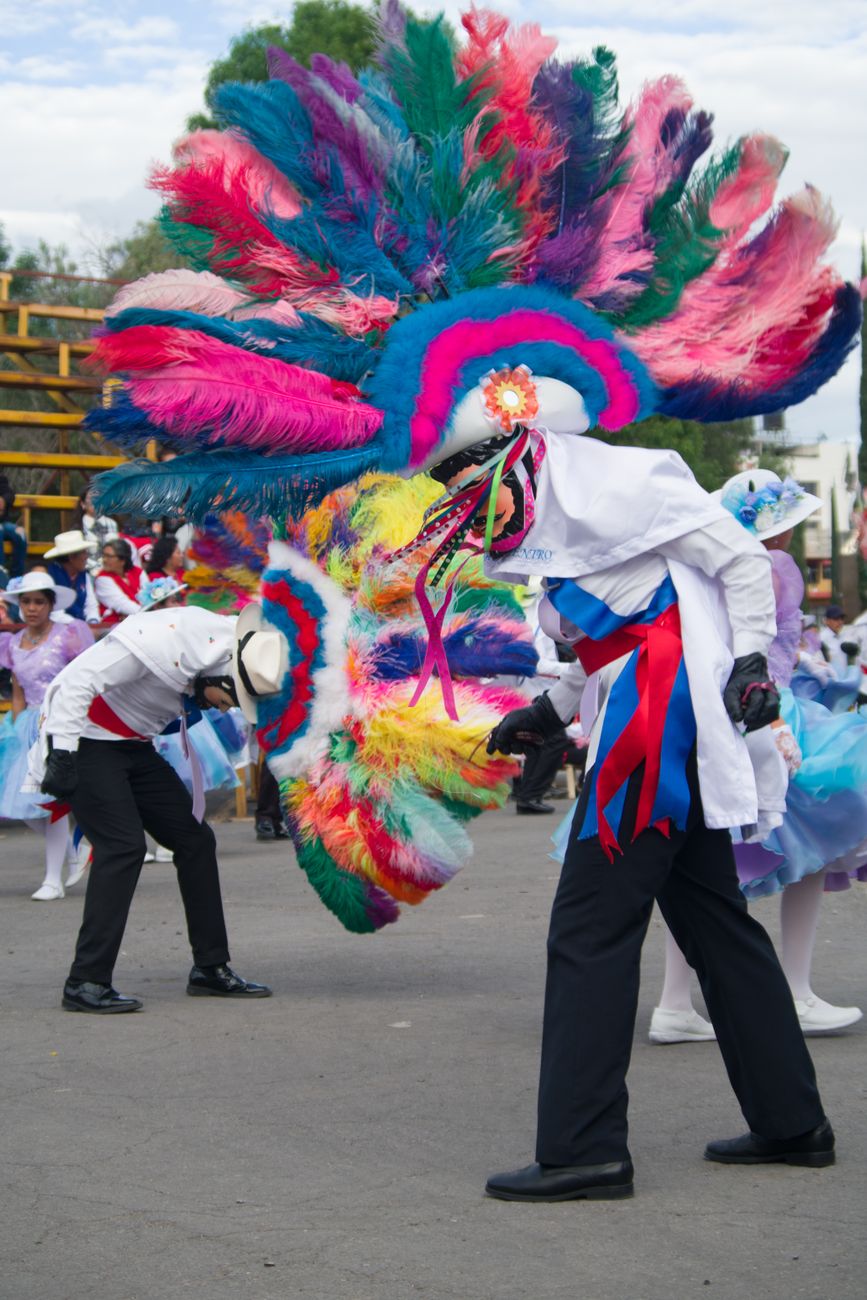 Colorful costumes and lively dancers celebrate the annual carnival in Tlaxcala, Mexico.
